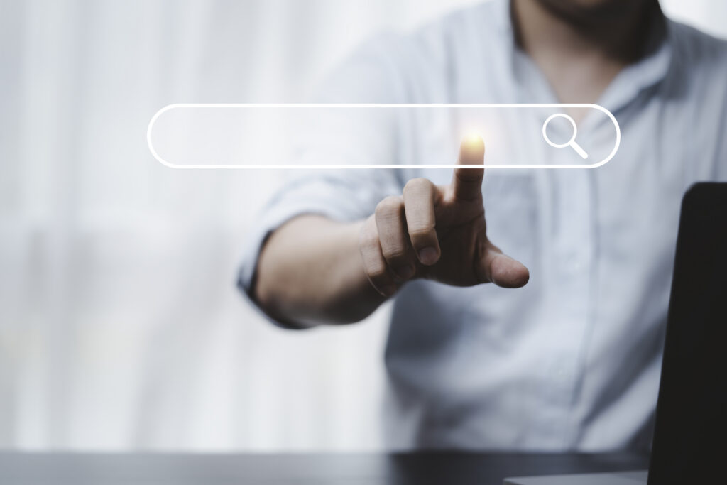 hand touching with search icon search engine optimisation seo concept find information by internet connection